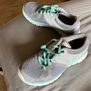 Nike gray and turquoise running shoes